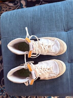 Nike White High-Top Sneakers with Orange Tongue Accent